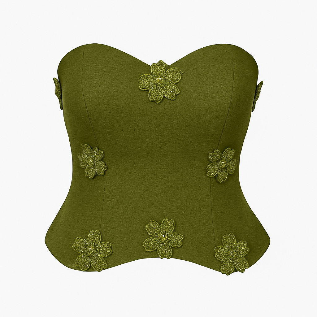 Green strapless top with floral embellishments on a white background